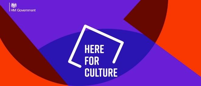 A bright red and purple abstract backdrop with the Here for Culture logo. 