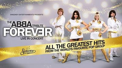 Band members of Abba Forever stand against a sparkly backdrop. 