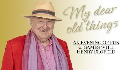 A headshot of Henry Blofeld against a golden backdrop. 