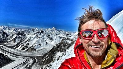 A close up of adventurer Kenton Cool on top of Mt Everest. 