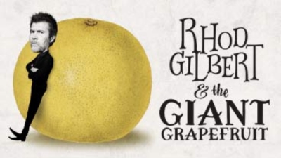 A caricature of comedian Rhod Gilbert against a giant grapefruit. 