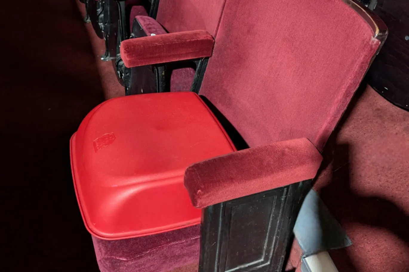 Winding Wheel Theatre circle seats with optional booster.